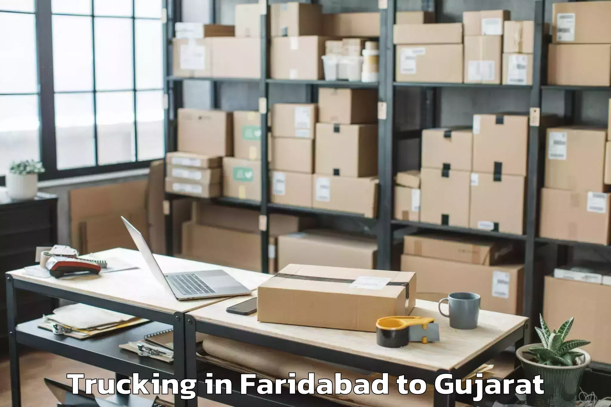 Affordable Faridabad to Udhana Trucking